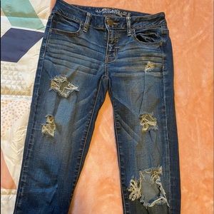 distressed american eagle jeggings size 4 mid-rise